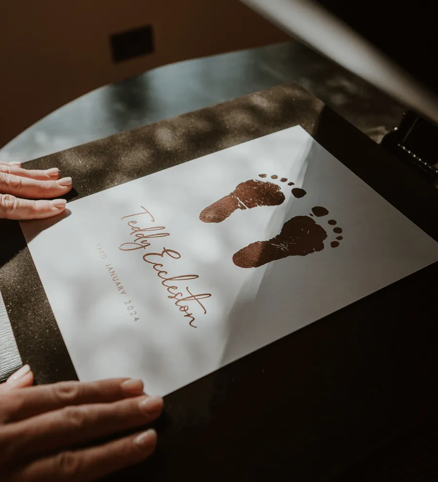Personalised foil footprints on archival card